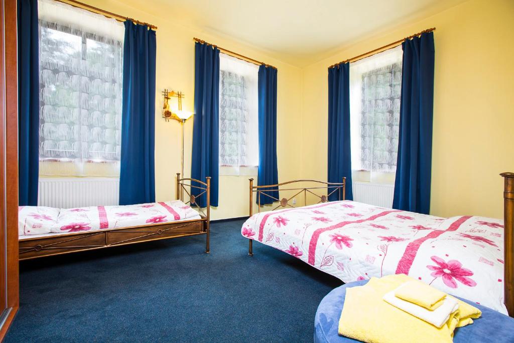 Łóżko lub łóżka w pokoju w obiekcie Yellow Ski Apartments