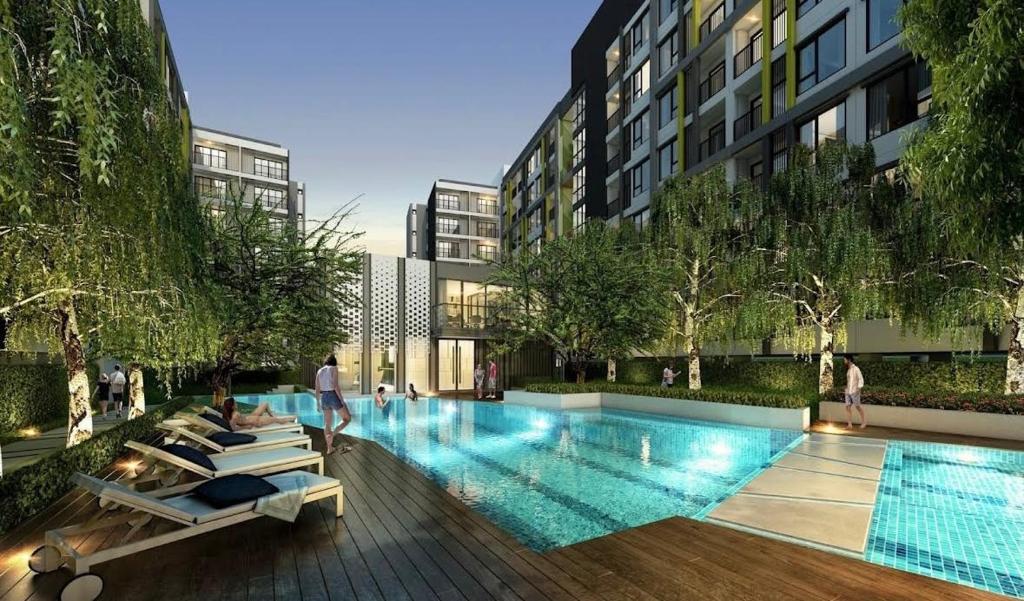 a rendering of a swimming pool in a building at Sukhumvit 50 apartment in Bangkok