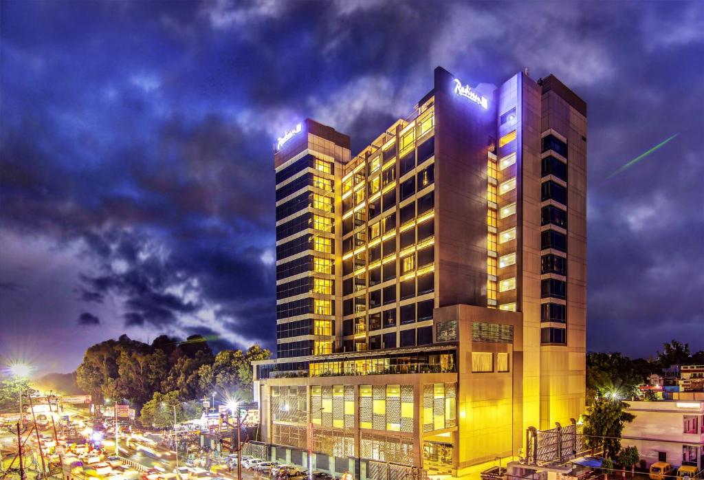 a rendering of a hotel at night at Radisson Blu Gorakhpur in Gorakhpur