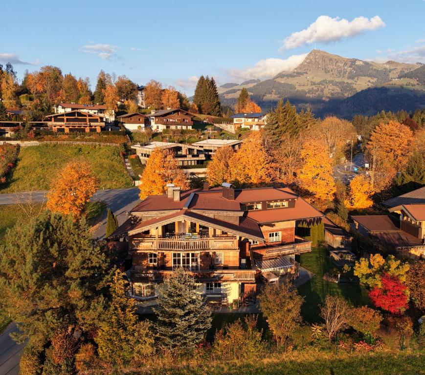 an aerial view of a house in the mountains at Apartments Golfweg in Kitzbühel