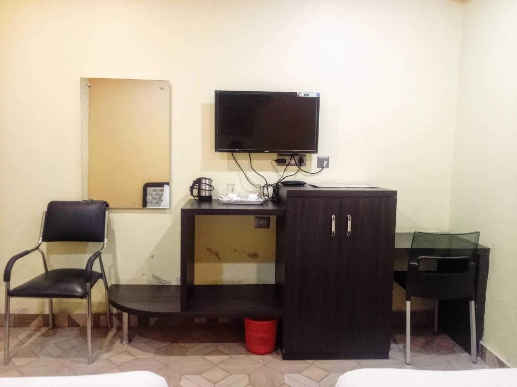 Kuchyň nebo kuchyňský kout v ubytování Hotel O Mahal