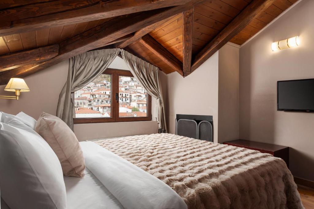 En eller flere senge i et værelse på Mons Arachova