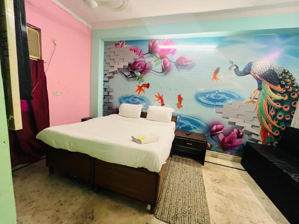 Postel nebo postele na pokoji v ubytování Hotel Blue Light - Sakrt Metro