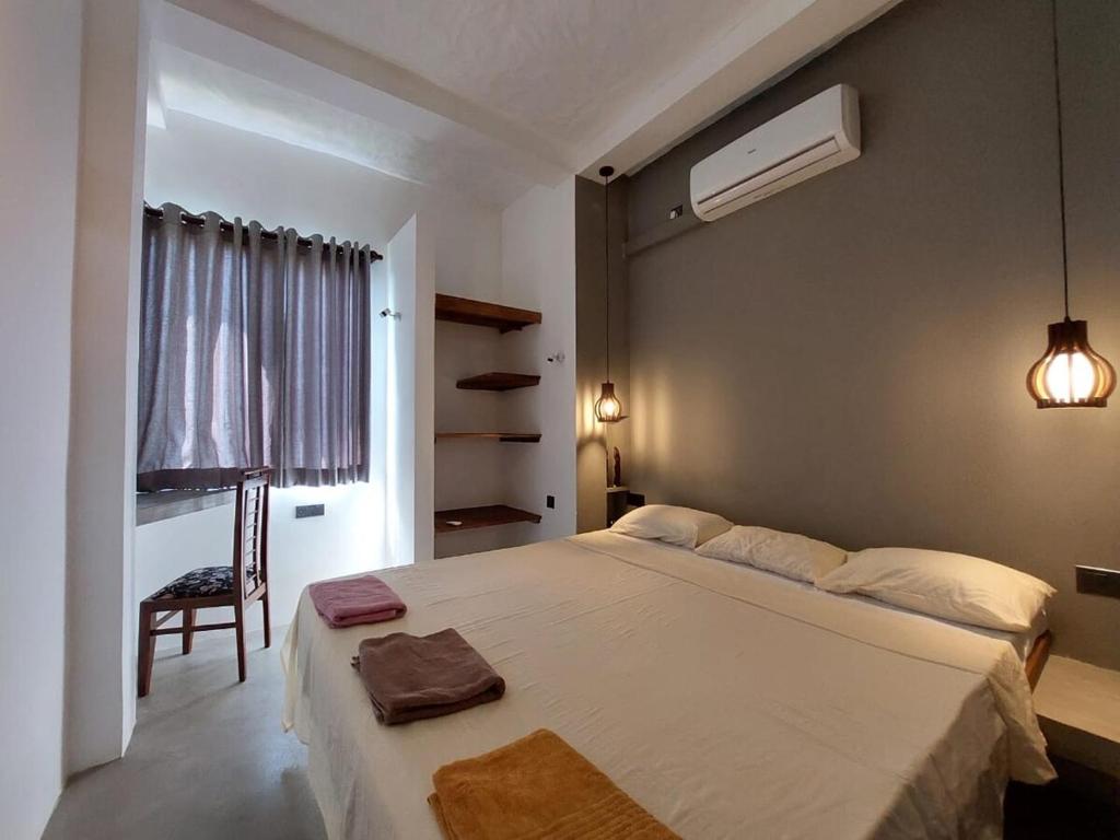 Ένα ή περισσότερα κρεβάτια σε δωμάτιο στο Villa unique view unawatuna