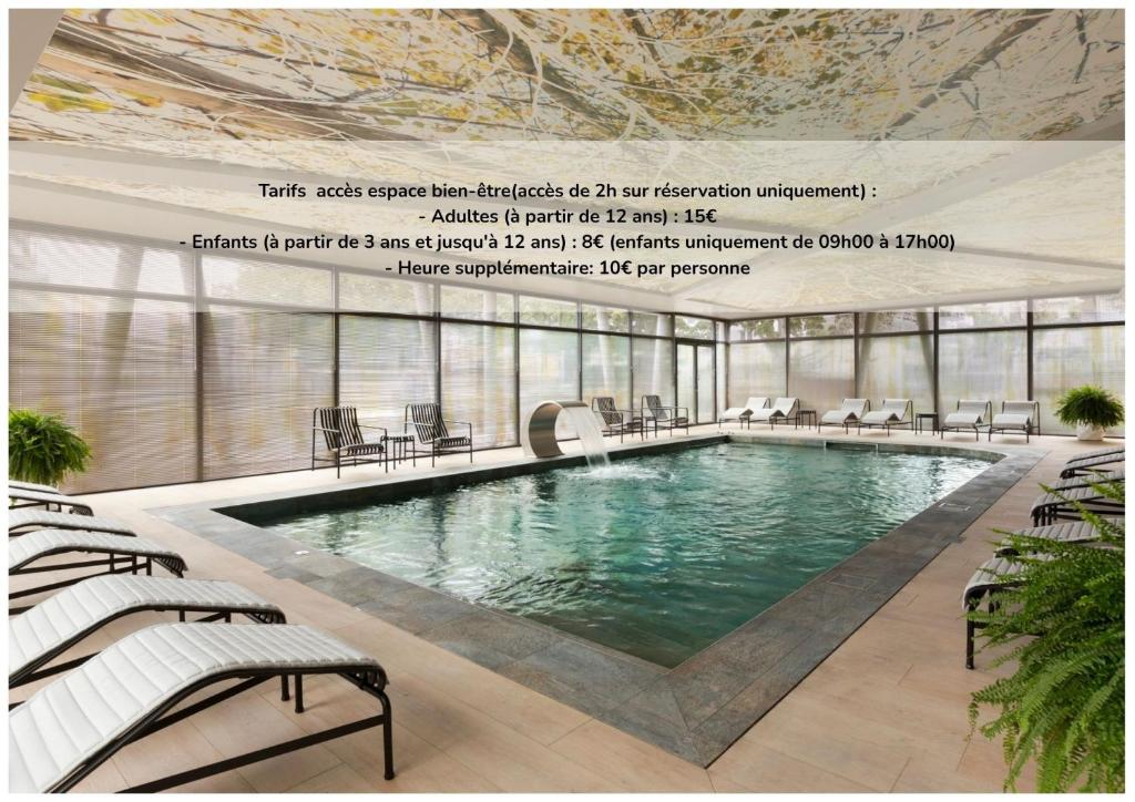 a rendering of a swimming pool in a building at Citadines Eurometropole Strasbourg in Strasbourg