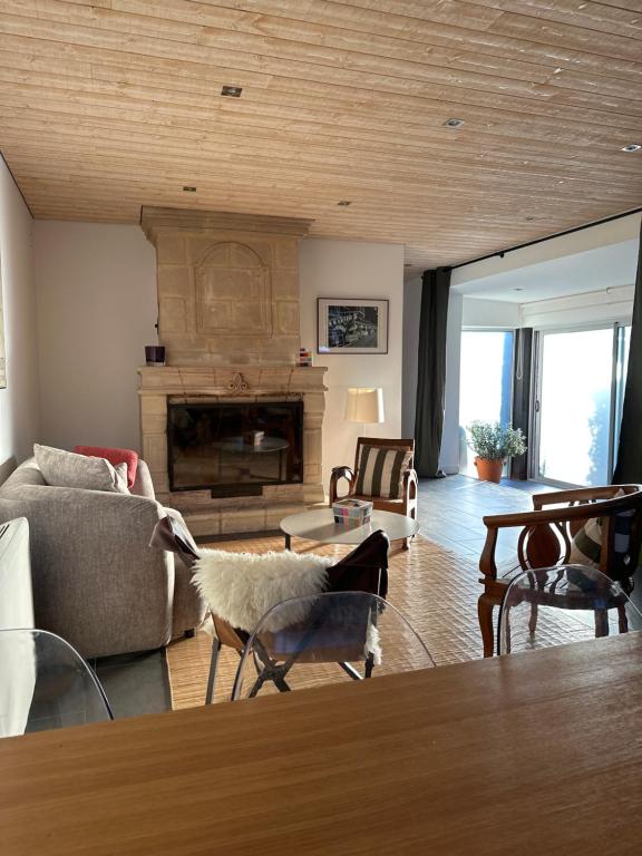 Posezení v ubytování Charmante maison à 10 mn d'Angers
