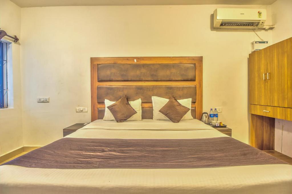 Postel nebo postele na pokoji v ubytování Hotel Flamingo