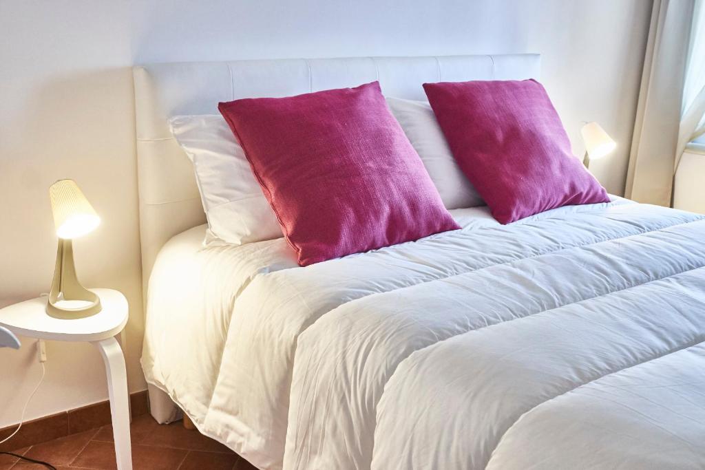 Postel nebo postele na pokoji v ubytování Yoga and sound 1