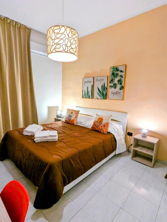 a bedroom with a large bed in a room at Incoming Quartieri Spagnoli in Naples
