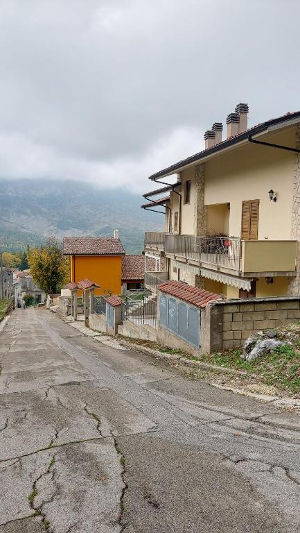 an empty street in front of a house at ApartRelax in SantʼEufemia a Maiella