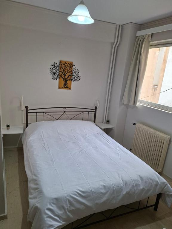 Postel nebo postele na pokoji v ubytování Charming Studio
