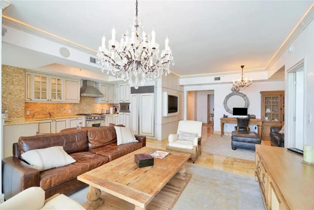 a living room with a couch and a table at Ocean & Intercoastal Views in Sunny Isles Beach