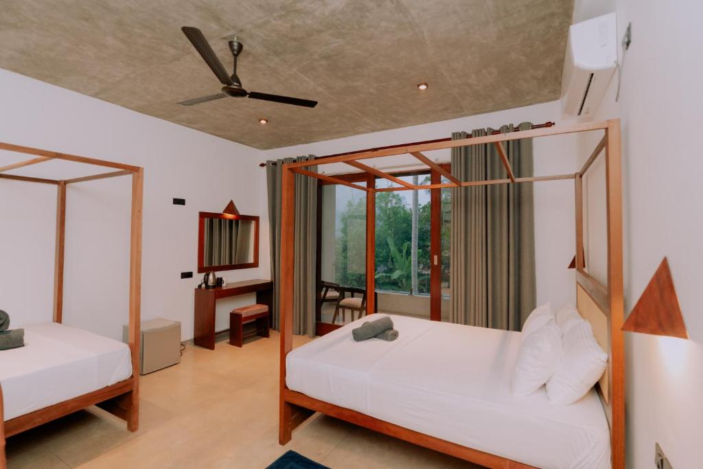 Ένα ή περισσότερα κρεβάτια σε δωμάτιο στο Amarante Madiha