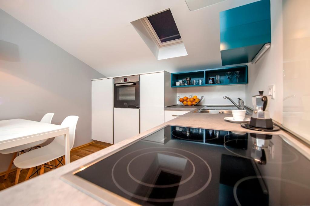 Kuchyň nebo kuchyňský kout v ubytování Apartment Lili