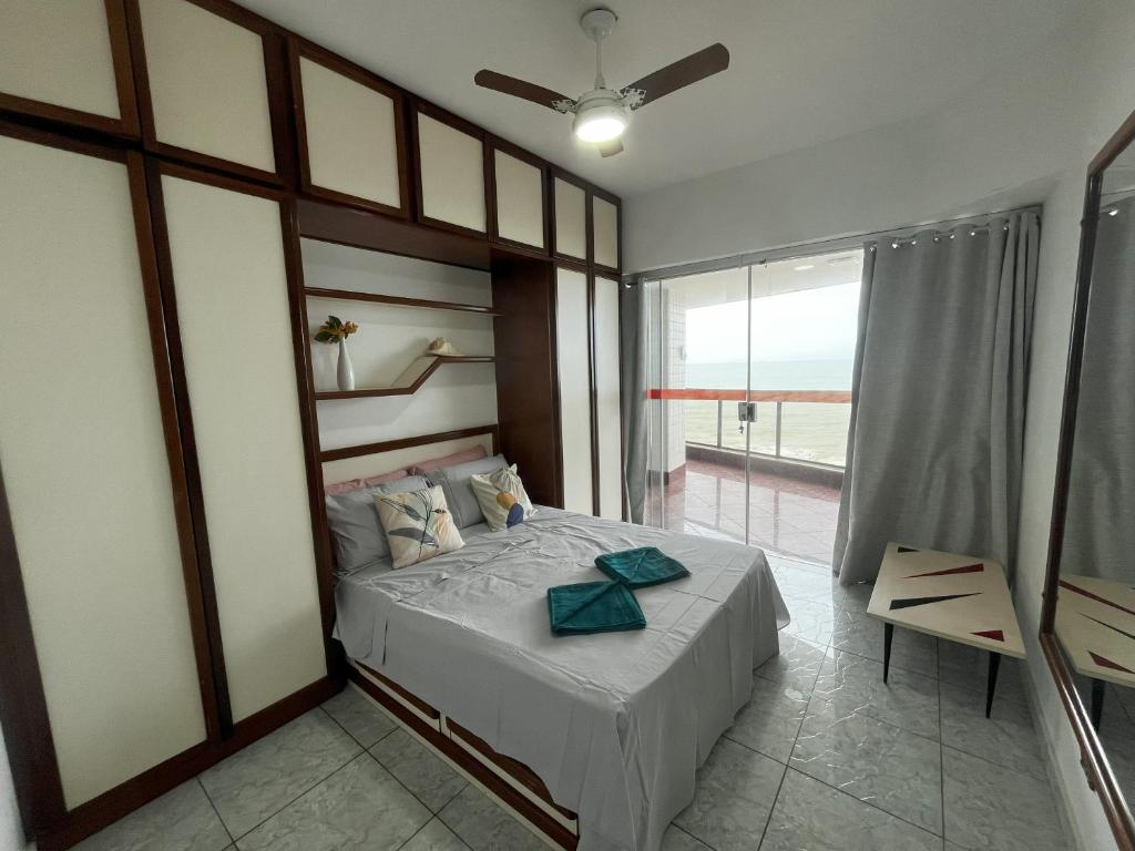 Postel nebo postele na pokoji v ubytování Varanda enorme na Praia dos Namorados