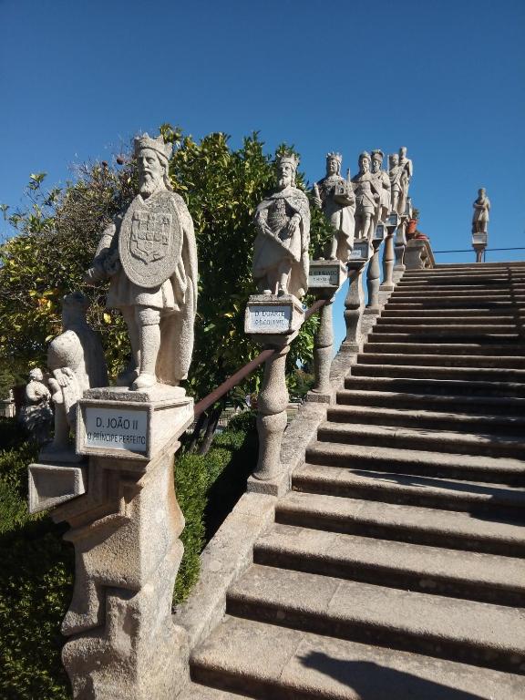 a group of statues on the side of a set of stairs at CiTY CENTER in Castelo Branco