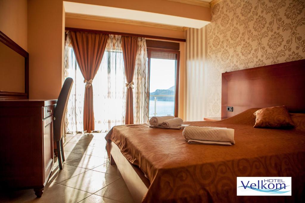 Postel nebo postele na pokoji v ubytování Hotel Velkom