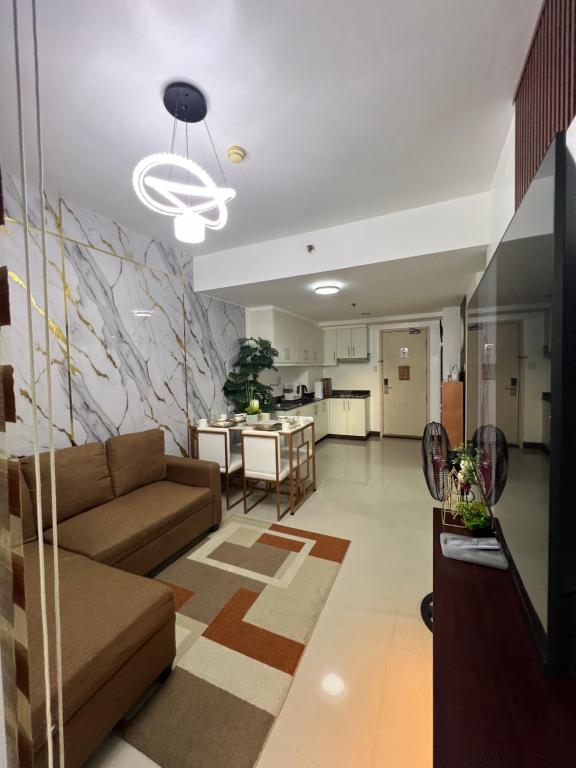 Η κουζίνα ή μικρή κουζίνα στο Condo Stay in front of Mall of Asia