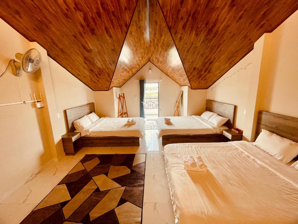 Postel nebo postele na pokoji v ubytování Merci Dalat Villa