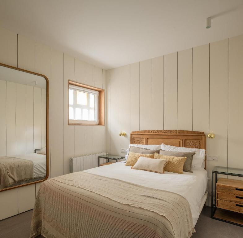 Postel nebo postele na pokoji v ubytování Neguri Apartment