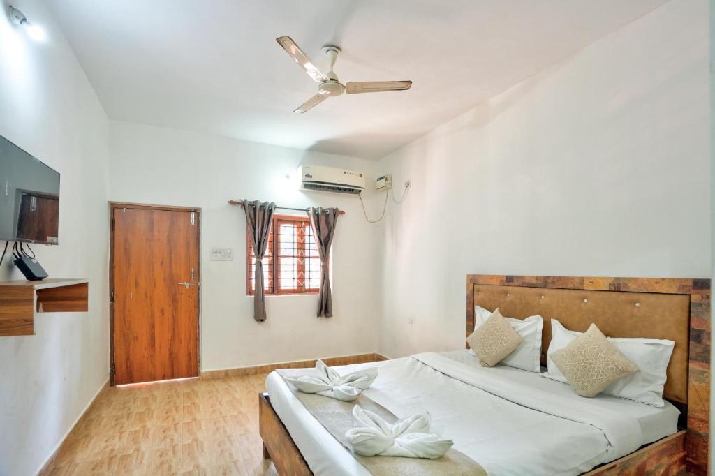 Ένα ή περισσότερα κρεβάτια σε δωμάτιο στο Hotel Albatross