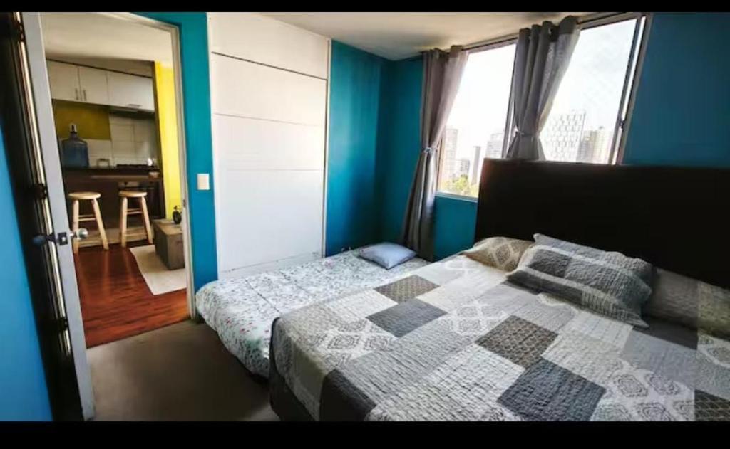 Postel nebo postele na pokoji v ubytování Departamento 1 dormitorio 1 baño cercano al aeropuerto