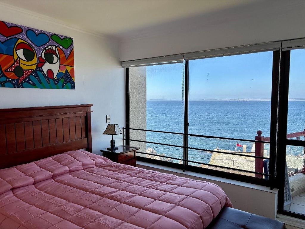 Ένα ή περισσότερα κρεβάτια σε δωμάτιο στο Hermoso depto en Higuerillas Primera Linea