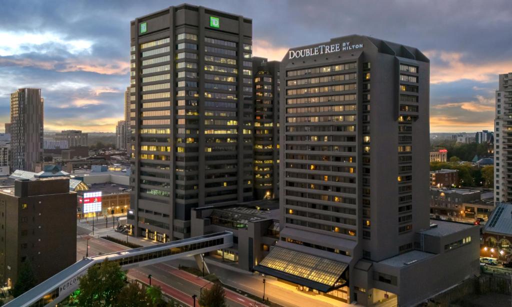 a view of a city skyline with tall buildings at Doubletree by Hilton London in London