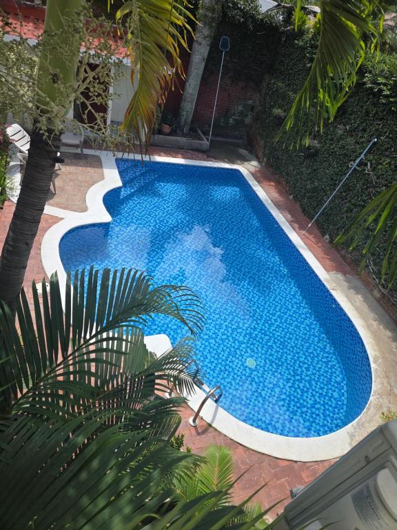 Πισίνα στο ή κοντά στο Mi Tierra Escalón Hotel y Restaurante