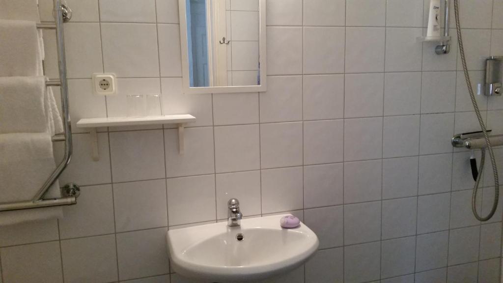 Koupelna v ubytování Lilla Hotellet