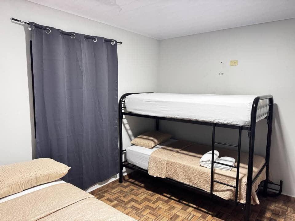 a bedroom with two bunk beds in a room at 3bed Apartments Center in David