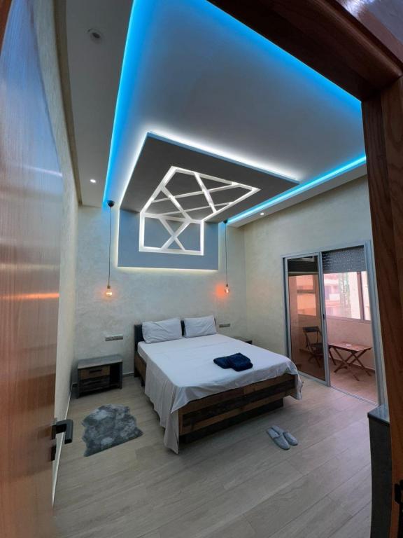 Ένα ή περισσότερα κρεβάτια σε δωμάτιο στο Modern and Luxury appartement centre of agdal