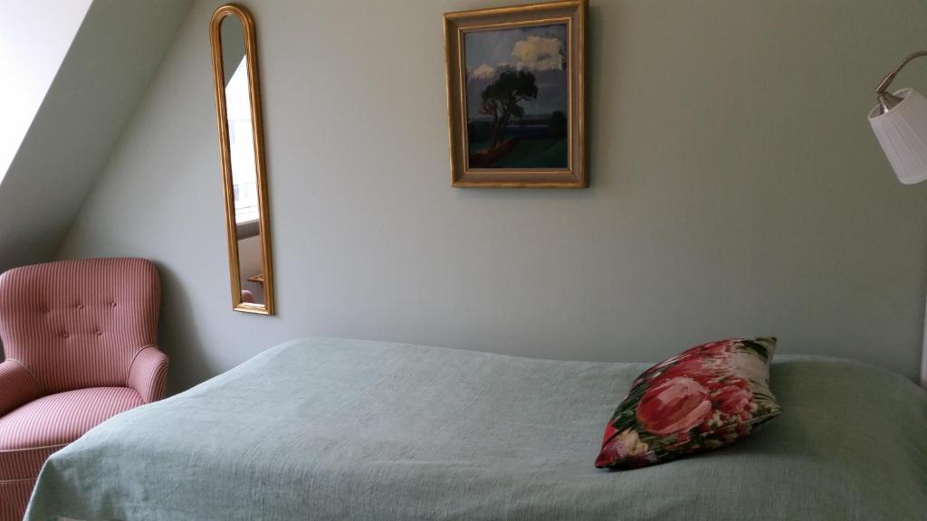 Postel nebo postele na pokoji v ubytování Lilla Hotellet