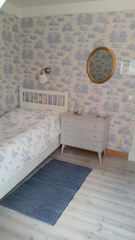Postel nebo postele na pokoji v ubytování Lilla Hotellet