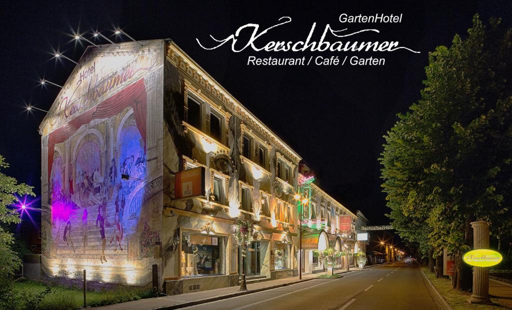 a building on the side of a street at night at Hotel Kerschbaumer in Sankt Valentin