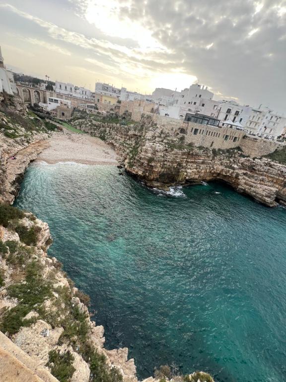 an aerial view of a beach with buildings and water at Porto Antico in Bari
