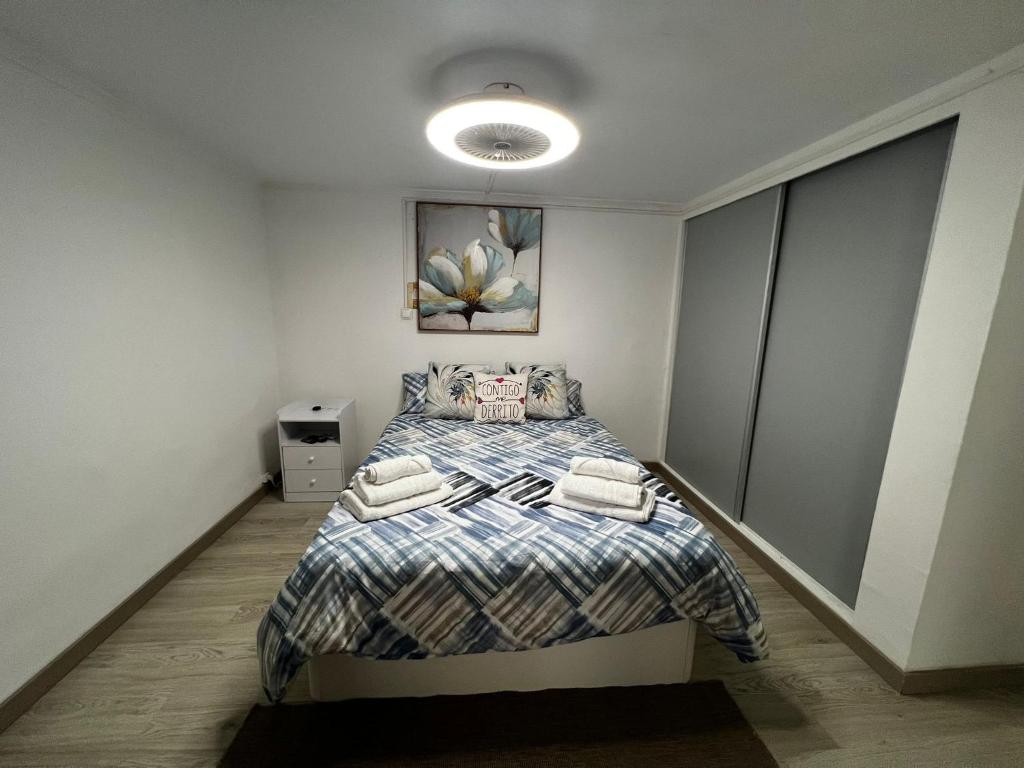 Ένα ή περισσότερα κρεβάτια σε δωμάτιο στο Phoenix Apartment