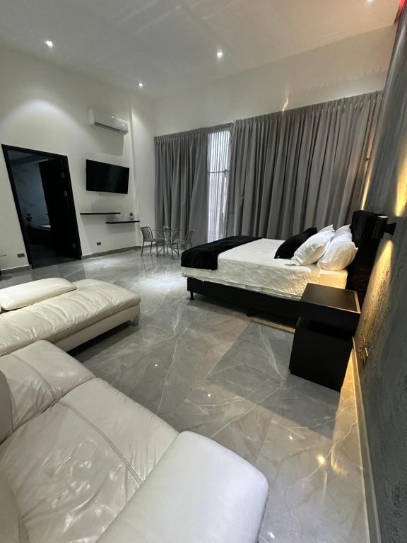 Ένα ή περισσότερα κρεβάτια σε δωμάτιο στο Penthouse 333