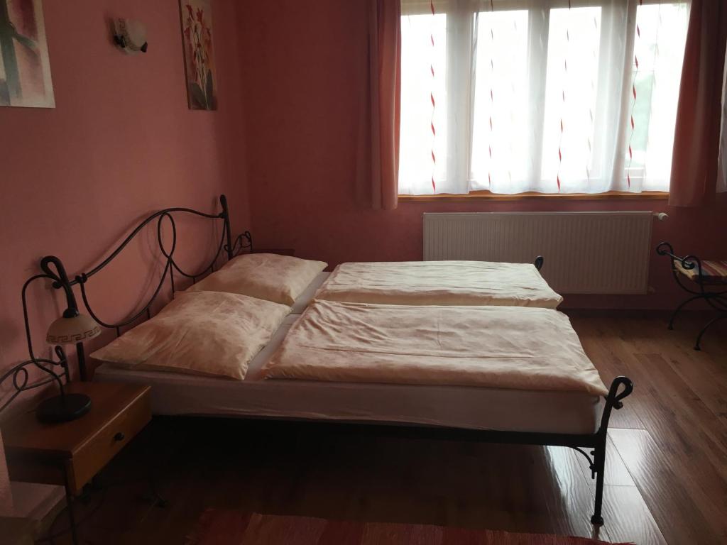 Postel nebo postele na pokoji v ubytování Apartmány PEMI Potštejn