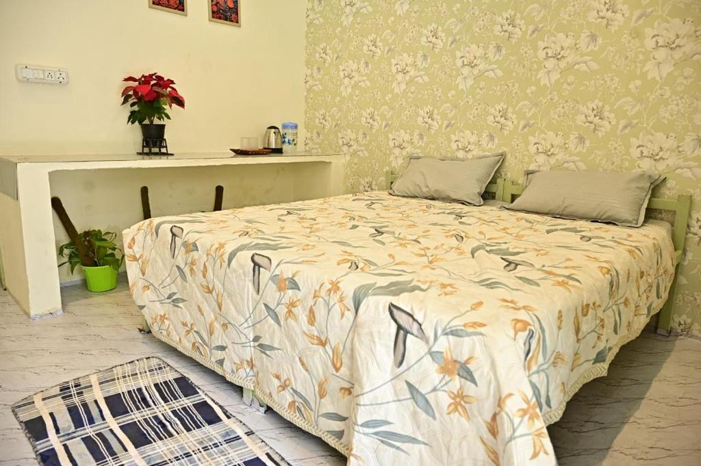 Postel nebo postele na pokoji v ubytování Prakriti wellness stay