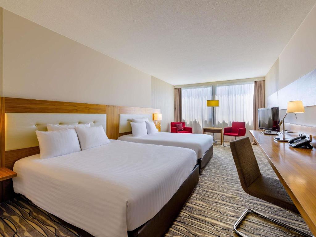 Mövenpick Hotel Geneva - Resim 13