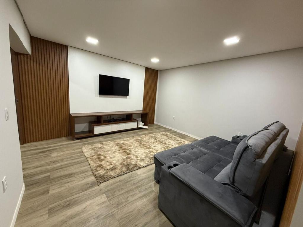 Μια τηλεόραση ή/και κέντρο ψυχαγωγίας στο Apartamento central