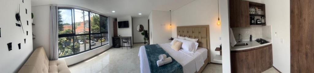 Et tv og/eller underholdning på Faro 201, 202, 203 Lujo en Laureles Ubicación Premium