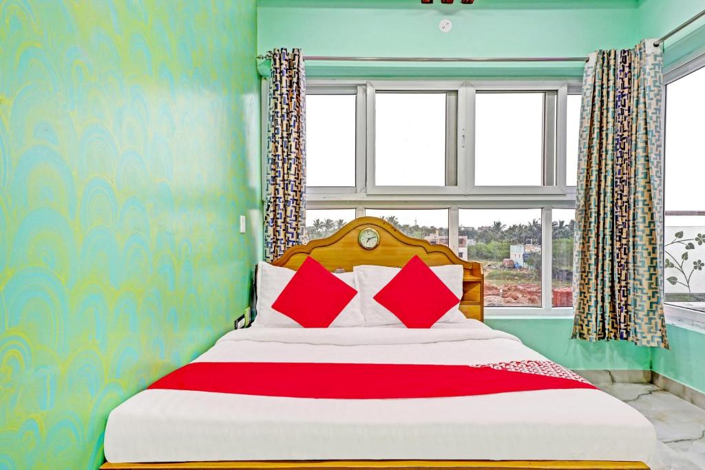 Ένα ή περισσότερα κρεβάτια σε δωμάτιο στο Hotel O Lake View Resort