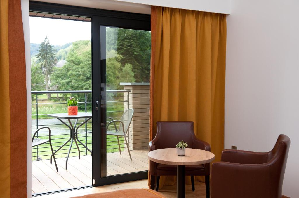 Balkón nebo terasa v ubytování Hotel Le Charme de la Semois