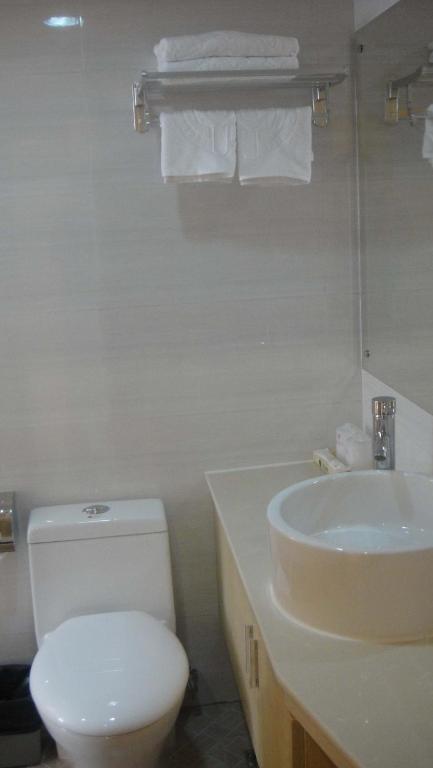 Koupelna v ubytování Guang Dong Hotel