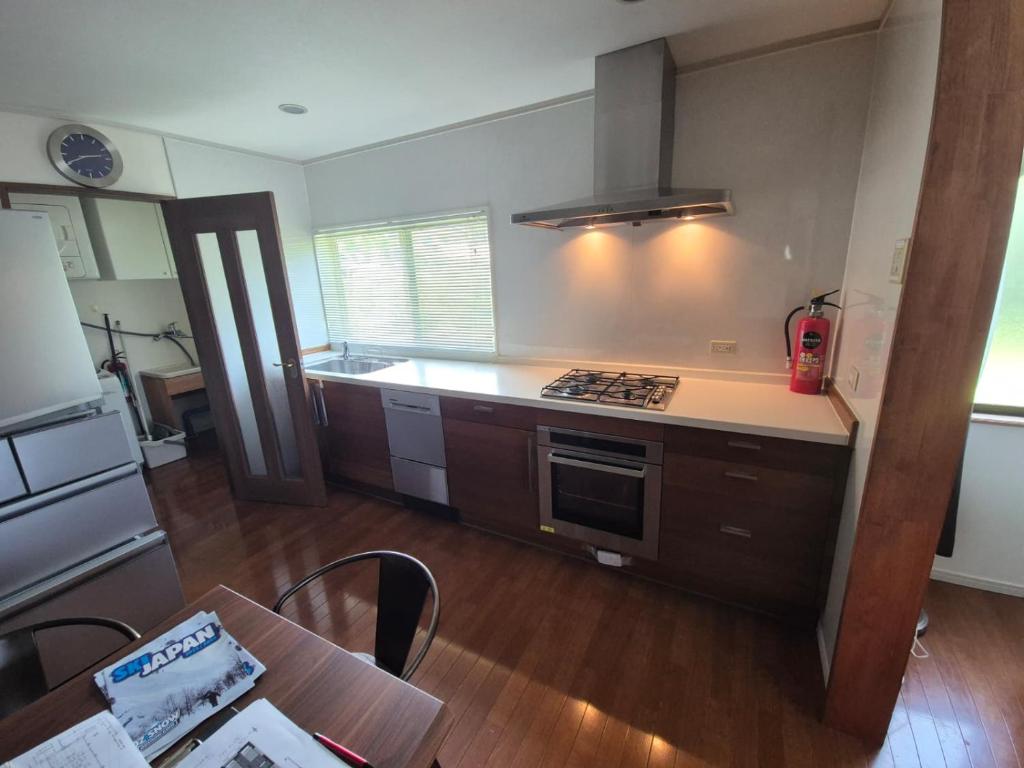 Kuchyň nebo kuchyňský kout v ubytování Hakuba Holiday Home