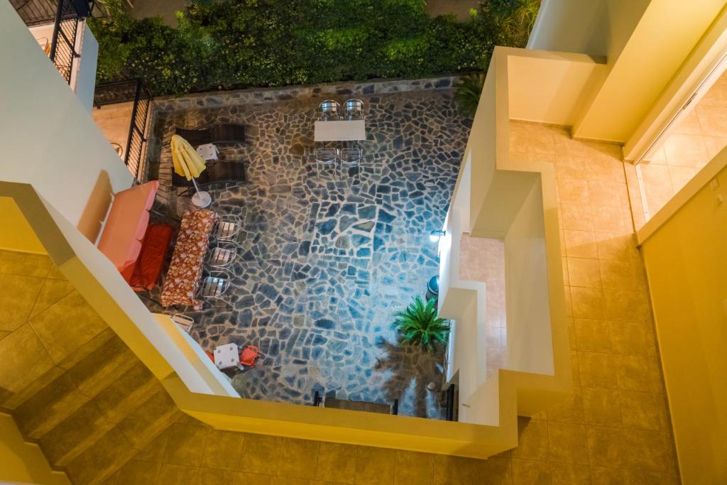 an overhead view of a swimming pool in a house at Vrokastro Apartments in Istro