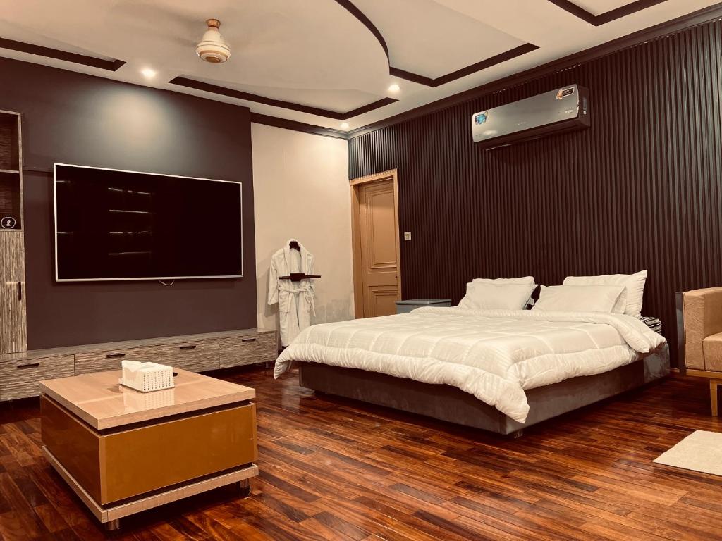 Postel nebo postele na pokoji v ubytování Horizon inn hotel