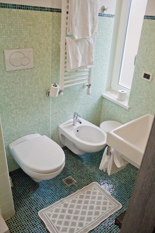 Koupelna v ubytování Hotel Siena